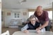 Couple looking at tablet together